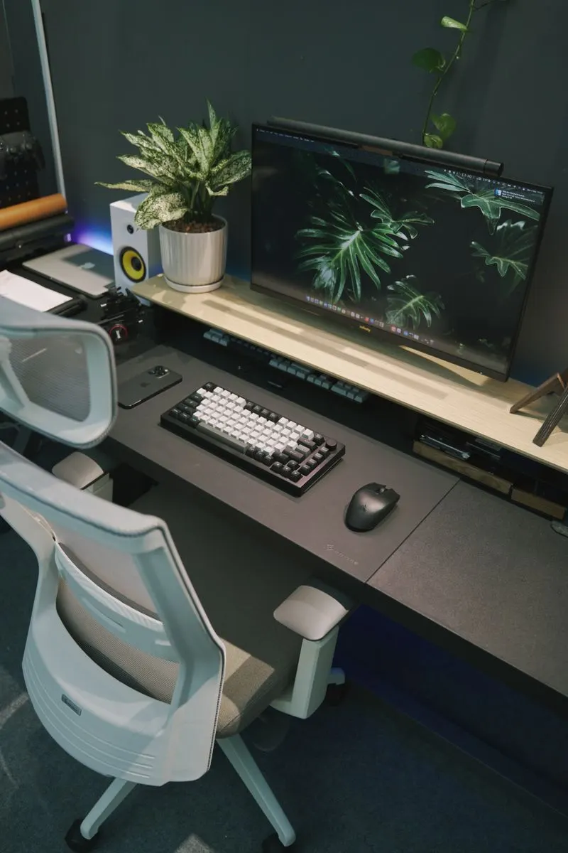 Designer workspace at night in violet light